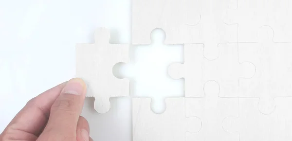 Connecting jigsaw puzzle. Business solutions success and strategy concept