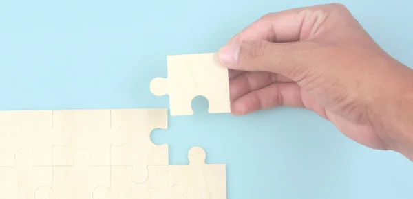 Connecting jigsaw puzzle. Business solutions success and strategy concept