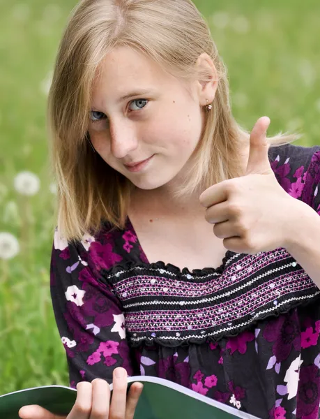 Girl the student shows gesture OK — Stock Photo, Image
