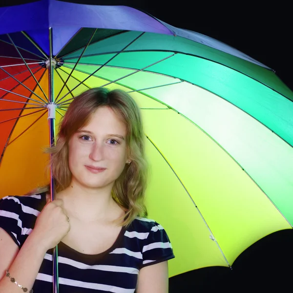 Smiling girl with colorful umbrella — Stock Photo, Image