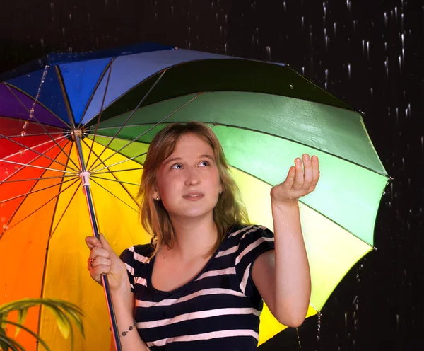 Smiling girl with colorful umbrella — Stock Photo, Image