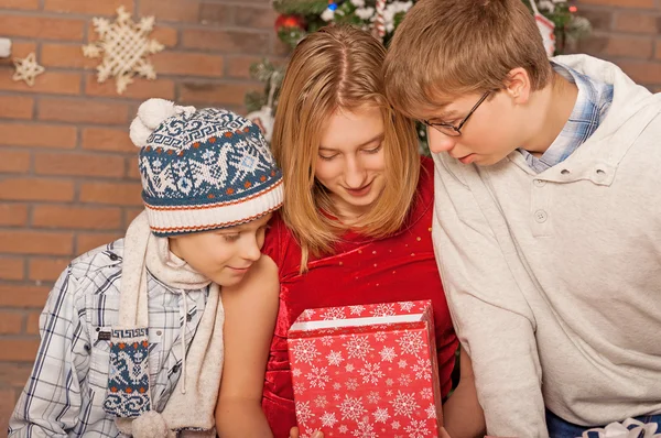 Happy Children Opening Gifts. New Year. — Stock Photo, Image