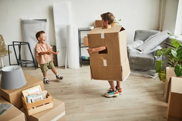 Boys in Boxes Playing in New House — Stock fotografie