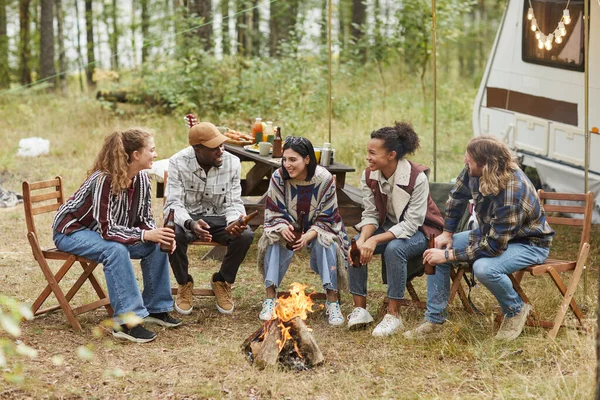 Multi Ethnic Group of Friends by Bonfire