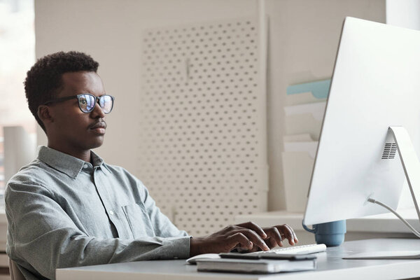 Young Man Working in Office