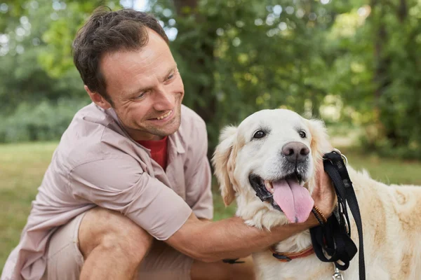 Portrait of Happy Man with Dog — Stock Photo, Image