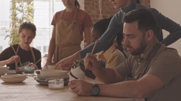 Chest Slowmo Shot Young Bearded Man Apron Painting Handmade Ceramic — Stock Video