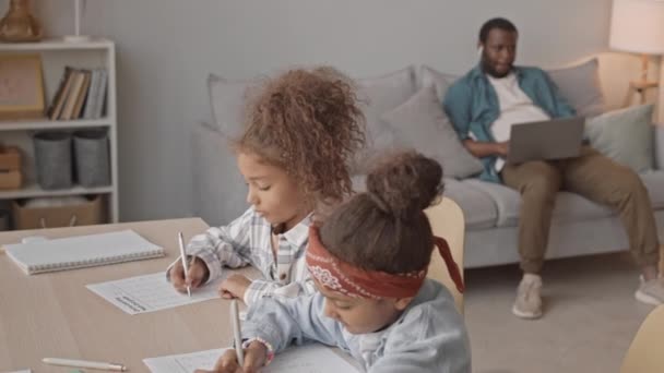 Slowmo Shot Two Little Sisters Doing Maths Tests Sitting Desk — Stock Video