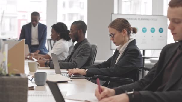 Side View Diverse Employees Sitting Desks Office Workday Caucasian Woman — Stock Video