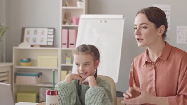 Waist Slowmo Shot Little Girl Female Speech Therapist Looking Laptop — Stockvideo