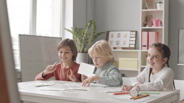 Waist Slowmo Shot Three Caucasian Children Elementary Age Learning Alphabet — Αρχείο Βίντεο