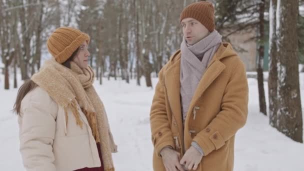 Medium Slowmo Shot Young Caucasian Couple Standing Forest Cold Winter — Video Stock