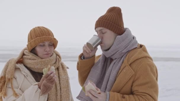 Medium Shot Young Caucasian Couple Having Conversation While Drinking Hot — Stok video