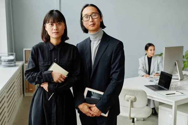 Waist Portrait Two Asian Entrepreneurs Looking Camera While Standing Office — Stockfoto