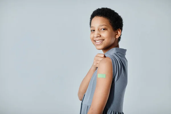 Smiling Girl with Vaccine Plaster — Fotografia de Stock