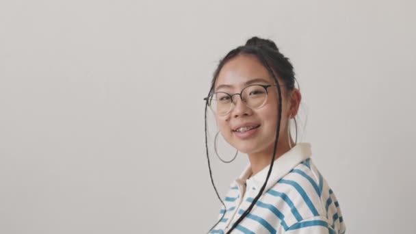 Chest Portrait Pretty Asian Teenage Girl Bun Two Braids Turning — Stock Video