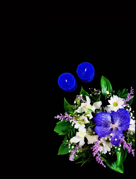 Trendy bouquet with flower of blue classic color on dark background. Romantic background with candles. Copy space — Stock Photo, Image