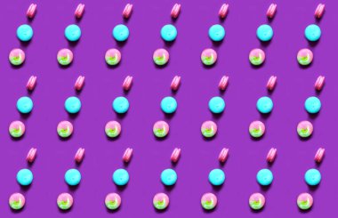 Pattern of colored macaroons on perfect purple background in vintage style. Creative copy space
