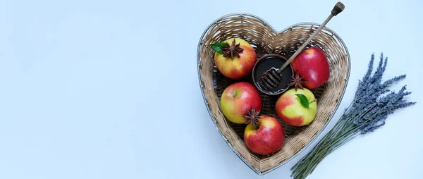 Red Apples Honey Straw Basket Made Shape Heart Blue Background — Fotografia de Stock