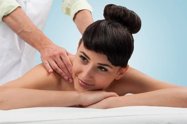 Peaceful and beautiful woman getting a massage from a man, layi — Stock Photo, Image