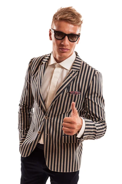 Young funky businessman showing thumbs up — Stock Photo, Image