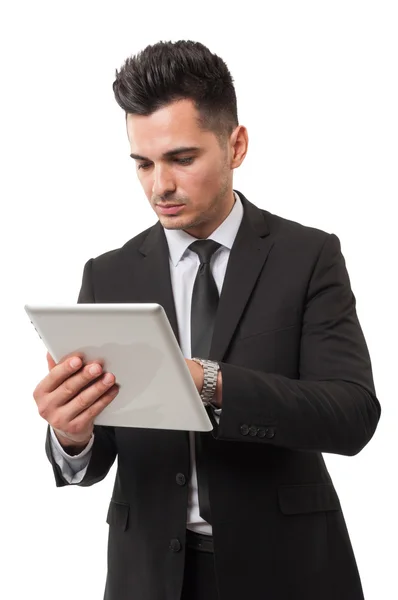 Business man checking his ipad for stock market news — Stock Photo, Image