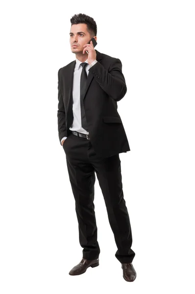 Hombre de negocios moderno y elegante contestando su teléfono —  Fotos de Stock
