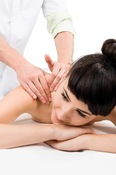 Relaxed female model getting a massag — Stock Photo, Image