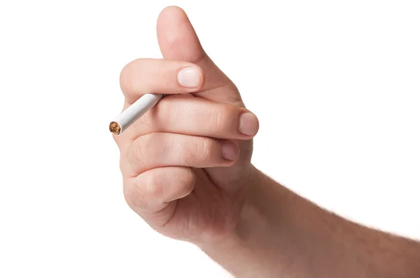 La main d'un Blanc tenant une cigarette sur un fond blanc — Photo