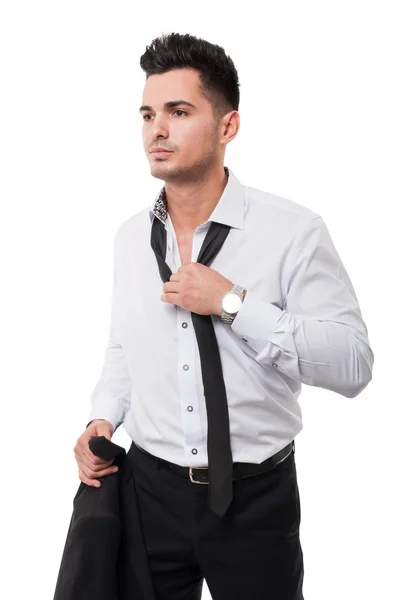 Business man loosing his black neckti — Stock Photo, Image