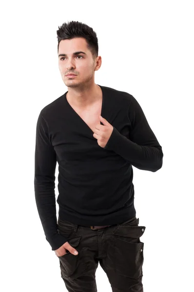 Handsome male model pulling his sweate — Stock Photo, Image