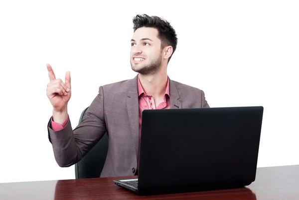 Elegante business man pointng in de ai — Stockfoto