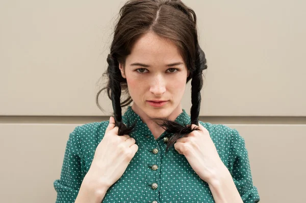 Girl with natural look making pigtails or ponytail — Stock Photo, Image