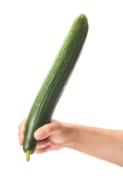 Hand holding a cucumber as a pe — Stock Photo, Image