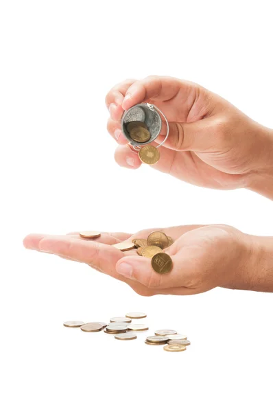 Pouring a small bucket of coin — Stock Photo, Image