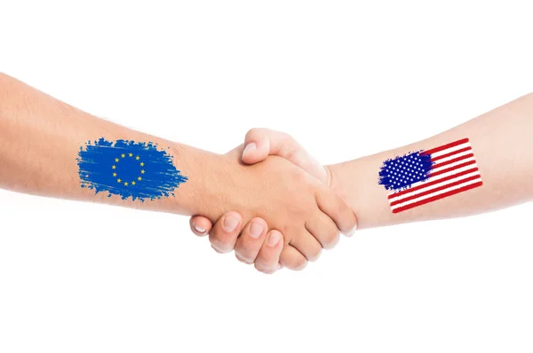 European Union and USA hands shaking with flags — Stock Photo, Image