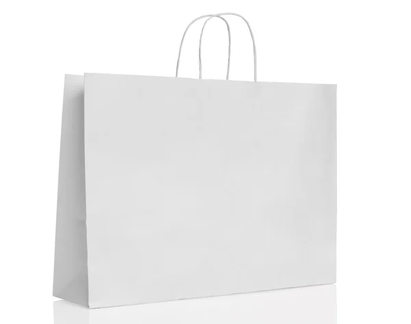 White paper shopping bag isolated with reflection — Stock Photo, Image