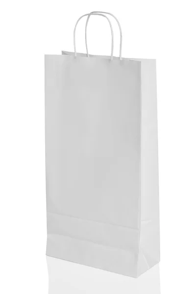 White paper shopping bag isolated with reflection — Stock Photo, Image