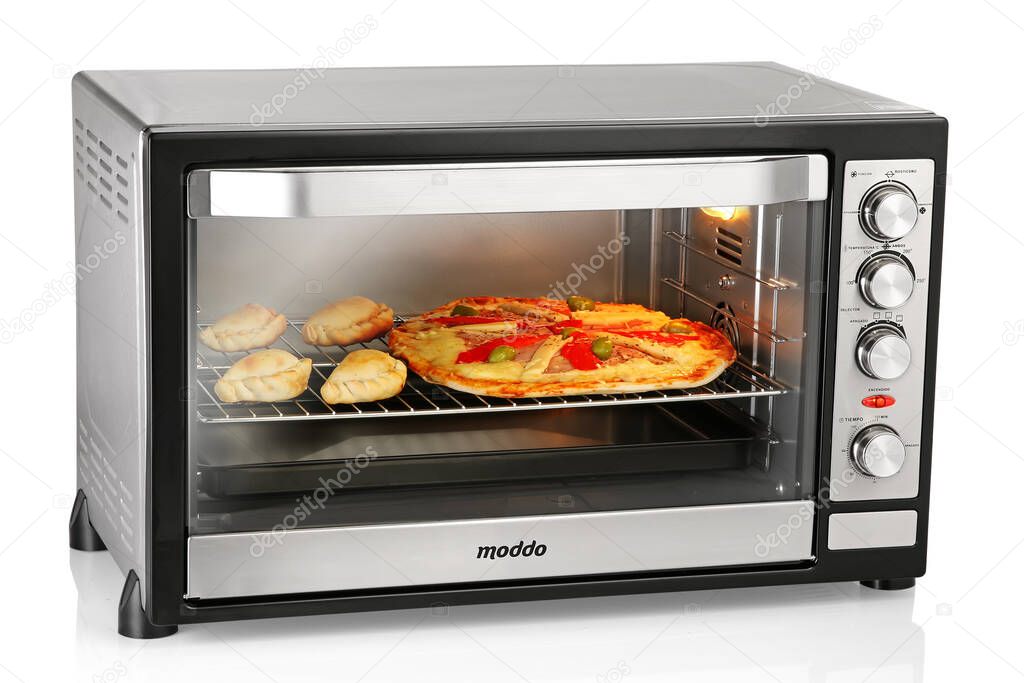 Electric oven over white background
