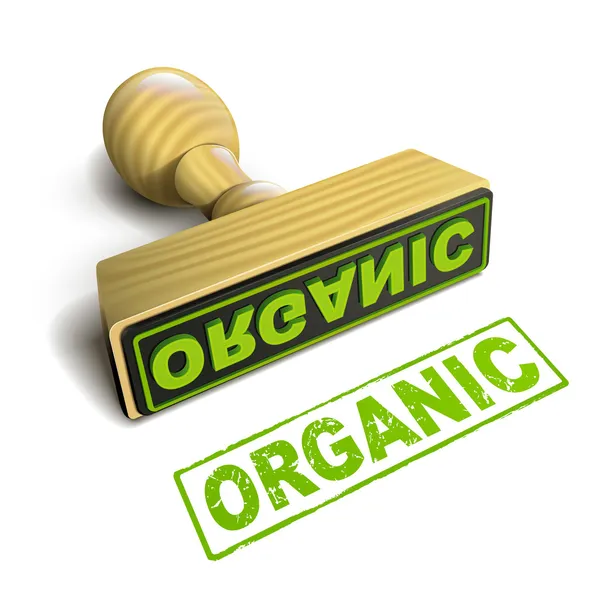 Stempel organische met groene tekst op witte — Stockvector
