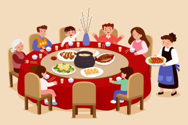 Asyalı aile grubu, bej arka plandaki bir restoranın yuvarlak masasında toplanma yemeği yiyor.