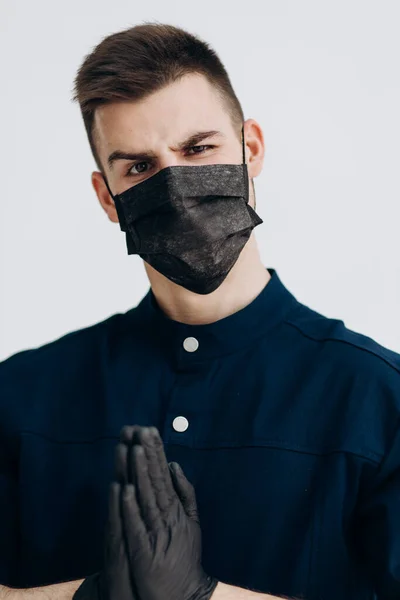 Male Doctor Black Gloves Puts Mask Covid — Stock Photo, Image