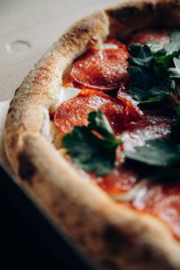 Delicious and juicy Italian pizza with sausage