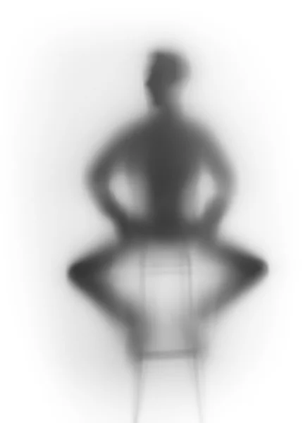 Man sitting on chair shadow — Stock Photo, Image
