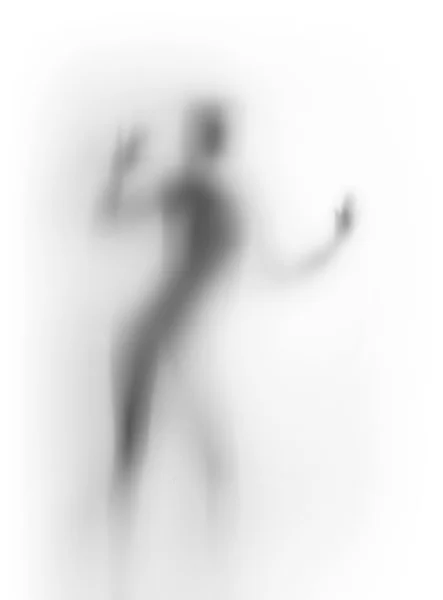 Silhueta difusa de um corpo de mulher dançante — Fotografia de Stock