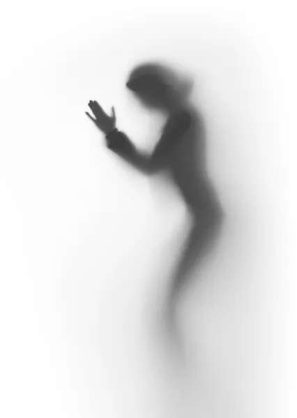 Diffuse silhouette of a praying human — Stock Photo, Image