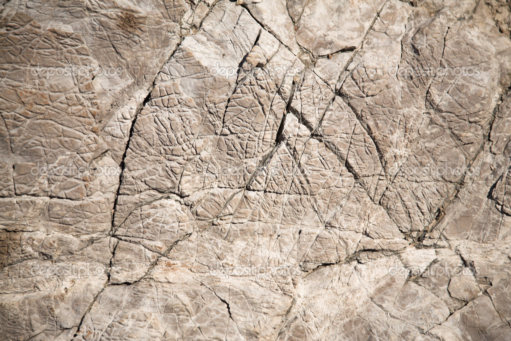 Oberflächenstruktur aus grauem Stein - Stockfotografie: lizenzfreie