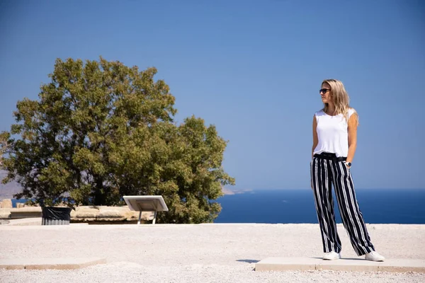 Pretty Woman Striped Trousers White Shirt Sunglasses Stands Top Hill — Fotografia de Stock