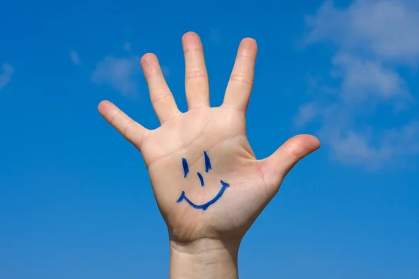 Human palm with smile — Stock Photo, Image