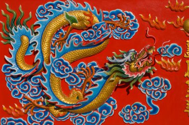 The nice dragon wall in chinese temple, Thailand. clipart